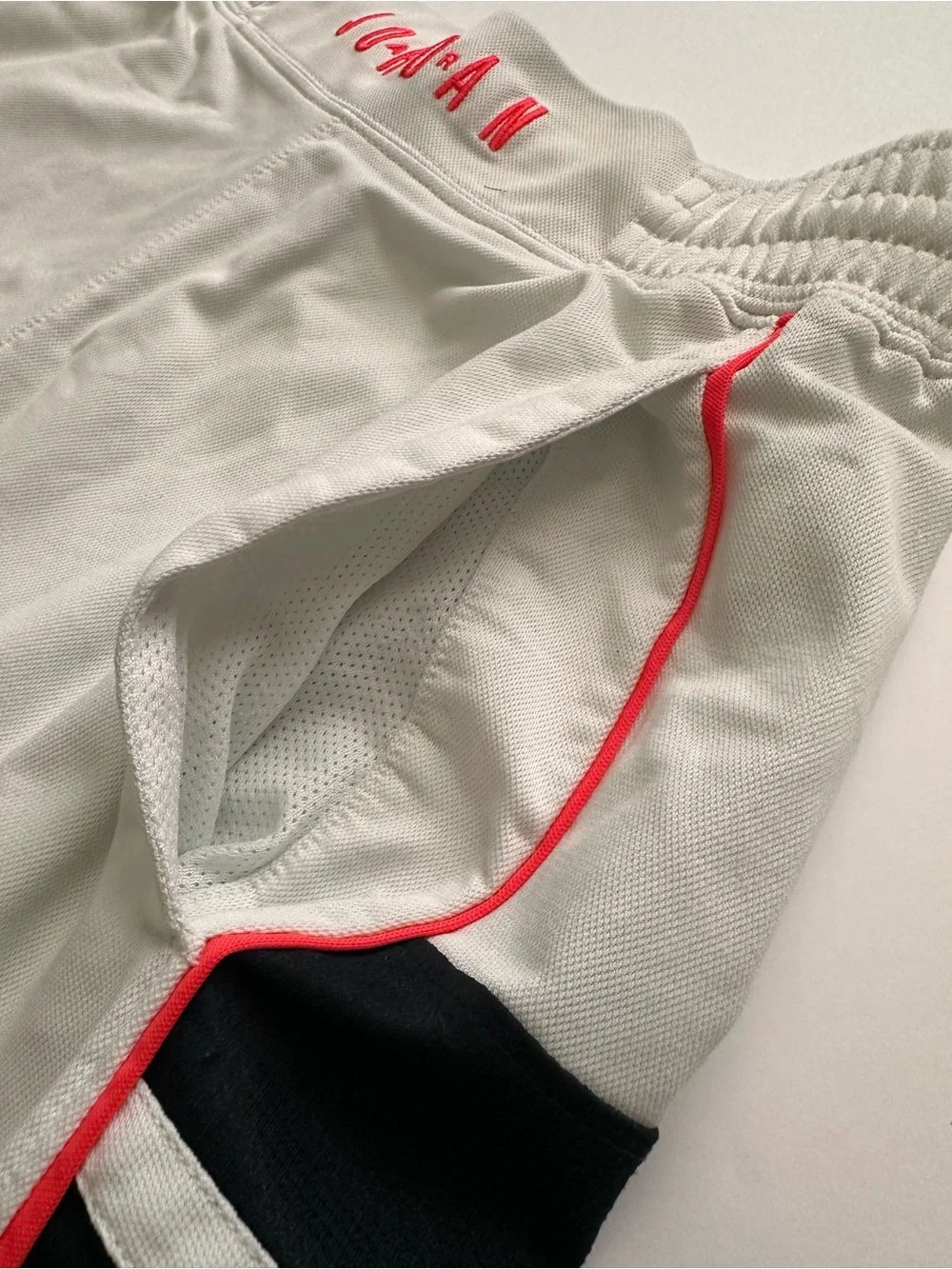 Jordan White Basketball Shorts w Black Side Panels & Salmon Accents (fits a M/L)